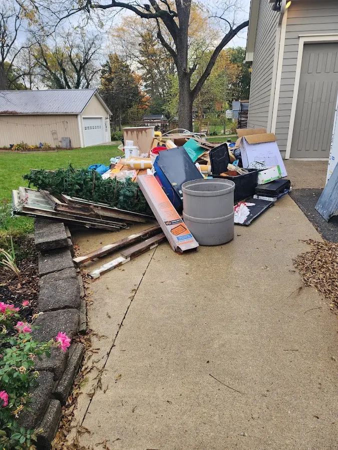 Dumpster being loaded with debris for 30 Yard Dumpster Rental in Sugarland Run